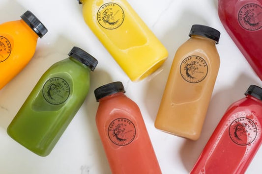 7 deep roots cold press juice bottles